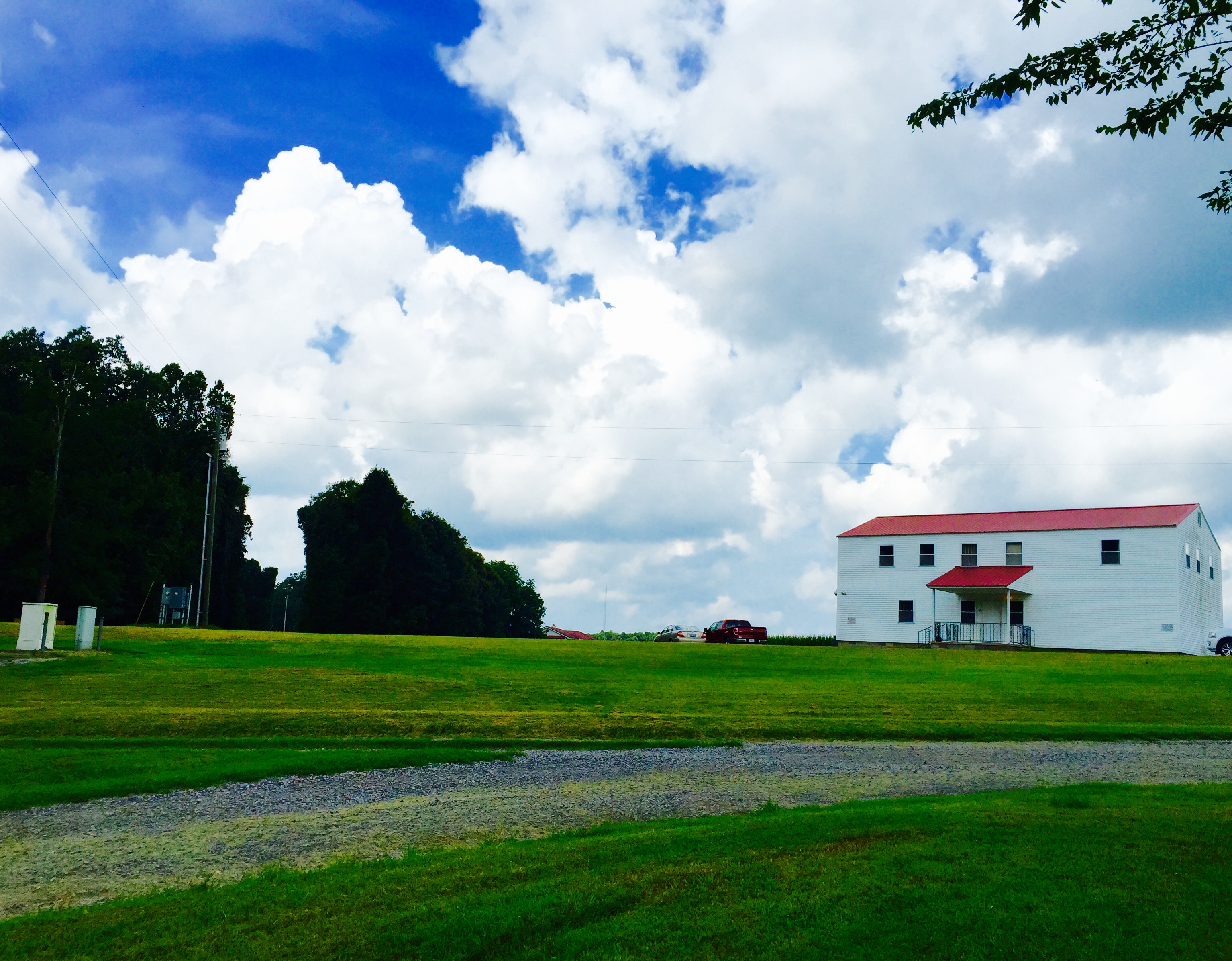 Clouds loom large--both literally and figuratively--over Ag Connections, a high tech company housed in an old tobacco barn in Murray, Kentucky. 