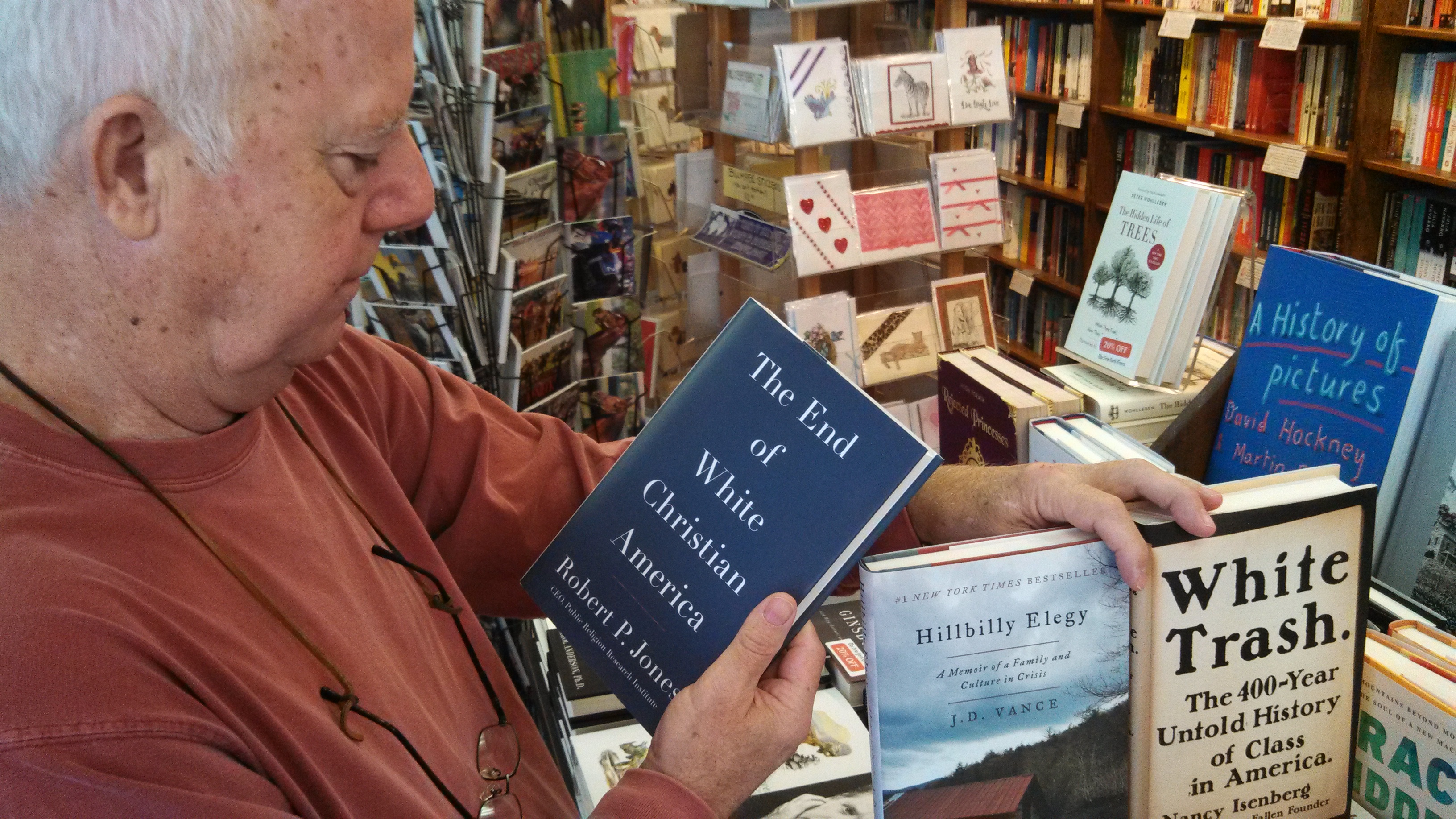 Carmichael's Books co-owner Michael Boggs with some of the recent books on the condition of the white working class.