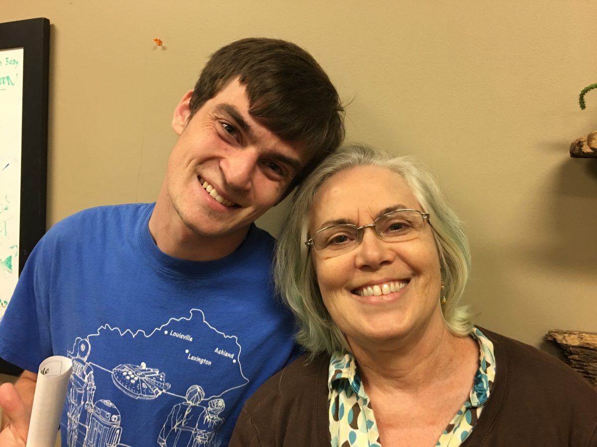 Jake Parsons with his mother at a strategy meeting to fight Medicaid cuts.
