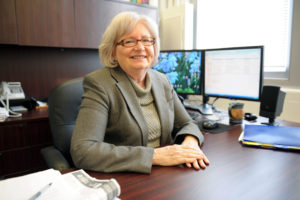 Susan Pinney at her desk.